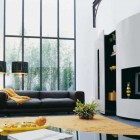 Black Colored Sofa Modern Black Colored Roche Bobois Sofa Set Placed On Vibrant Yellow Rug Setting In Front Of TV Unit Interior Design 38 Contemporary Living Room With Modern Sofas Designed By Roche Bobois