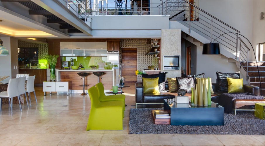 Lime Green Among Stunning Lime Green Chairs Placed Among Dark Quilted Sofa Set In Family Room To Match Green Scheme Of Kitchen Dream Homes Eclectic Contemporary Home In Hip And Vibrant Interior Style