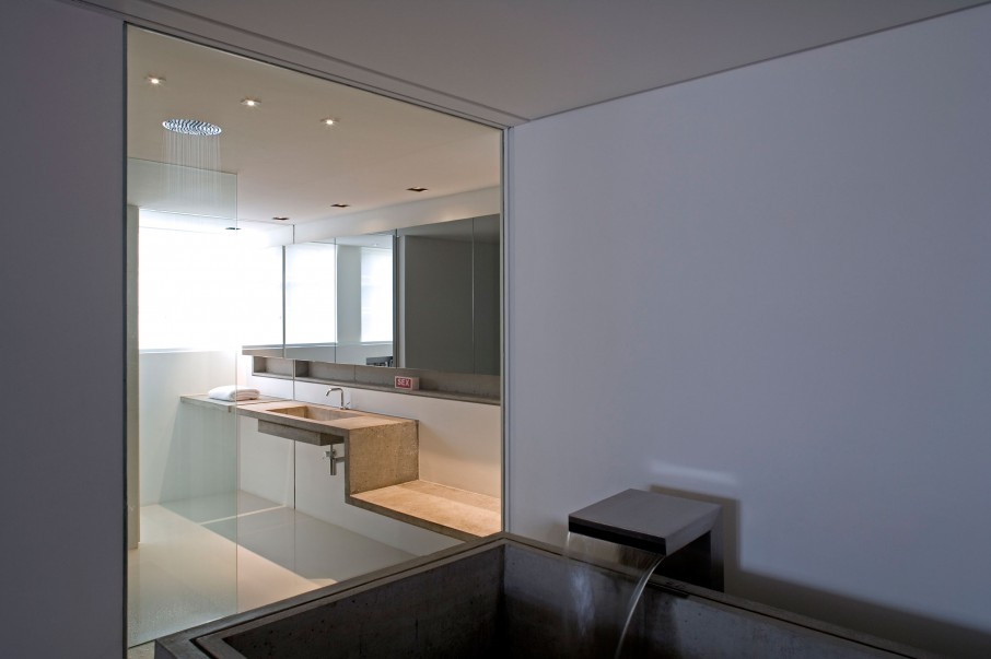 Contemporary Houssein Connected Transparent Contemporary Houssein Apartment Bathtub Connected To Vanity Area Through Wide Glass Window Creating Interesting Interplay Apartments Fascinating Modern-Industrial Apartment With Beautiful Sophisticated Accent