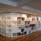 Sleek White Floor Wonderful Sleek White Bookcase In Floor To Ceiling Design Featured With Accent Ceiling Lamps Above For Alluring Presentation Apartments Fascinating Modern-Industrial Apartment With Beautiful Sophisticated Accent