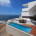 Infinity Pool Design Amazing Infinity Pool In Floating Design Of Contemporary Beach House Las Lomas Completed With Wooden Deck And Glass Railing Architecture Fabulous Beach Home Built On Stunning Rocky Landscape (+17 New Images)