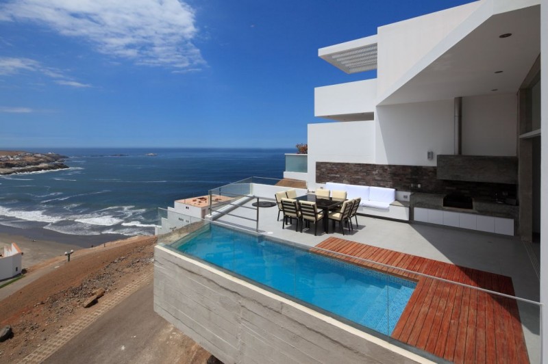 Infinity Pool Design Amazing Infinity Pool In Floating Design Of Contemporary Beach House Las Lomas Completed With Wooden Deck And Glass Railing Kitchens Fabulous Beach Home Built On Stunning Rocky Landscape