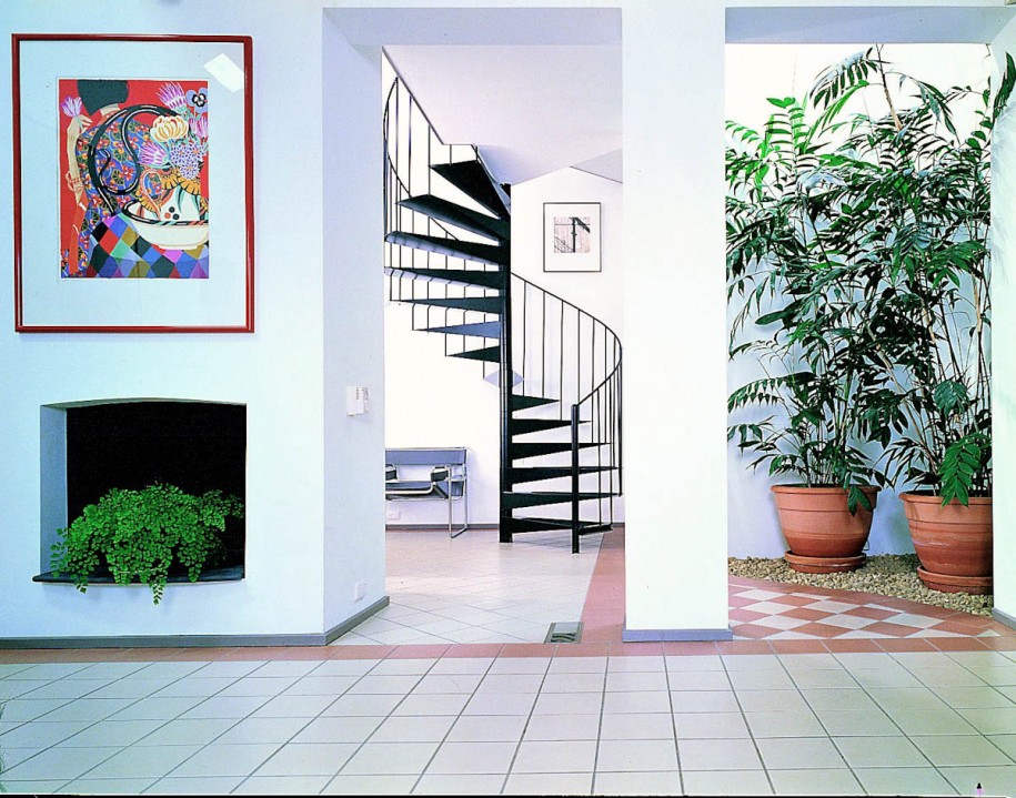 Spiral Staircase Paint Extraordinary Spiral Staircase With Abstract Paint On The White Wall Space Saving Staircase Designs Interior Others Black Metal Space Decoration Visualize Staircase Designs For Classy Center Of Awesome Interiors