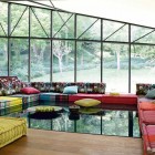 Roche Bobois Bright Long Roche Bobois In The Bright Living Room With Glossy Black Floor Hardwood Floor And Wide Glass Walls Dream Homes Stunning And Elegant Living Room With Futuristic Modern Furniture