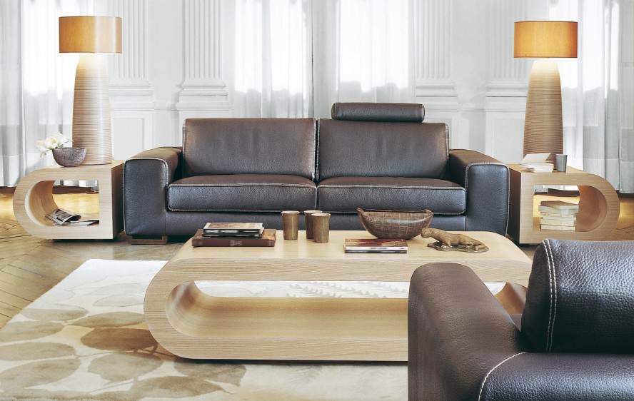 Wooden Table Living Natural Wooden Table In The Living Room With Roche Bobois Grey Sofas Brown Carpet And Hardwood Floor Dream Homes  Stunning And Elegant Living Room With Futuristic Modern Furniture