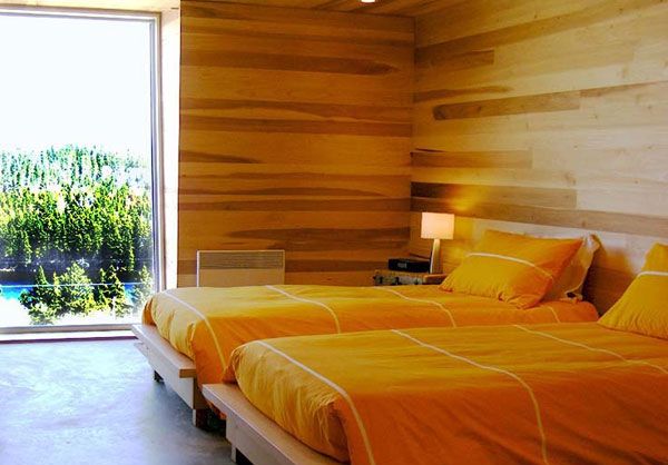 Catching Orange Wooden Eye Catching Orange Bedding On Wooden Platform Twin Beds To Improve Sliding House In Canada Kids Bedroom Architecture  Warm Minimalist Cabin With Black Furniture And Modern Fireplace