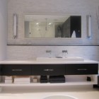 Modern Minimalist Lowes Gorgeous Modern Minimalist Bathroom Vanities Lowes With Rectangular Sink Large Mirror Shiny Wall Lights Pretty Ornamental Plant In Glass Vase Bathroom Stunning Bathroom Vanities Lowes Applied For Your Powder Room
