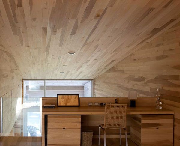 Woodn Sliding Canada Trendy Wooden Sliding House In Canada Workspace Interior With Asymmetric Ceiling Covering The Desk And Chair Architecture  Warm Minimalist Cabin With Black Furniture And Modern Fireplace